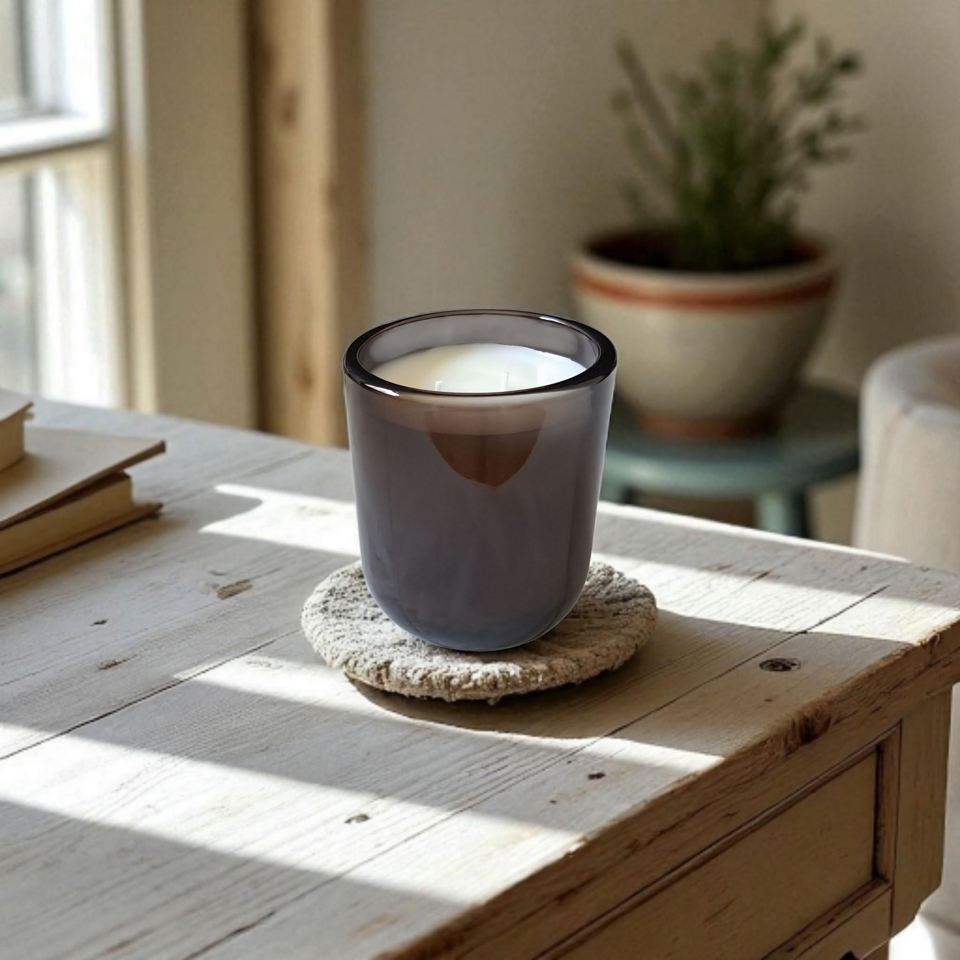 Mossfall luxury candle product shot on wood surface and natural lighting