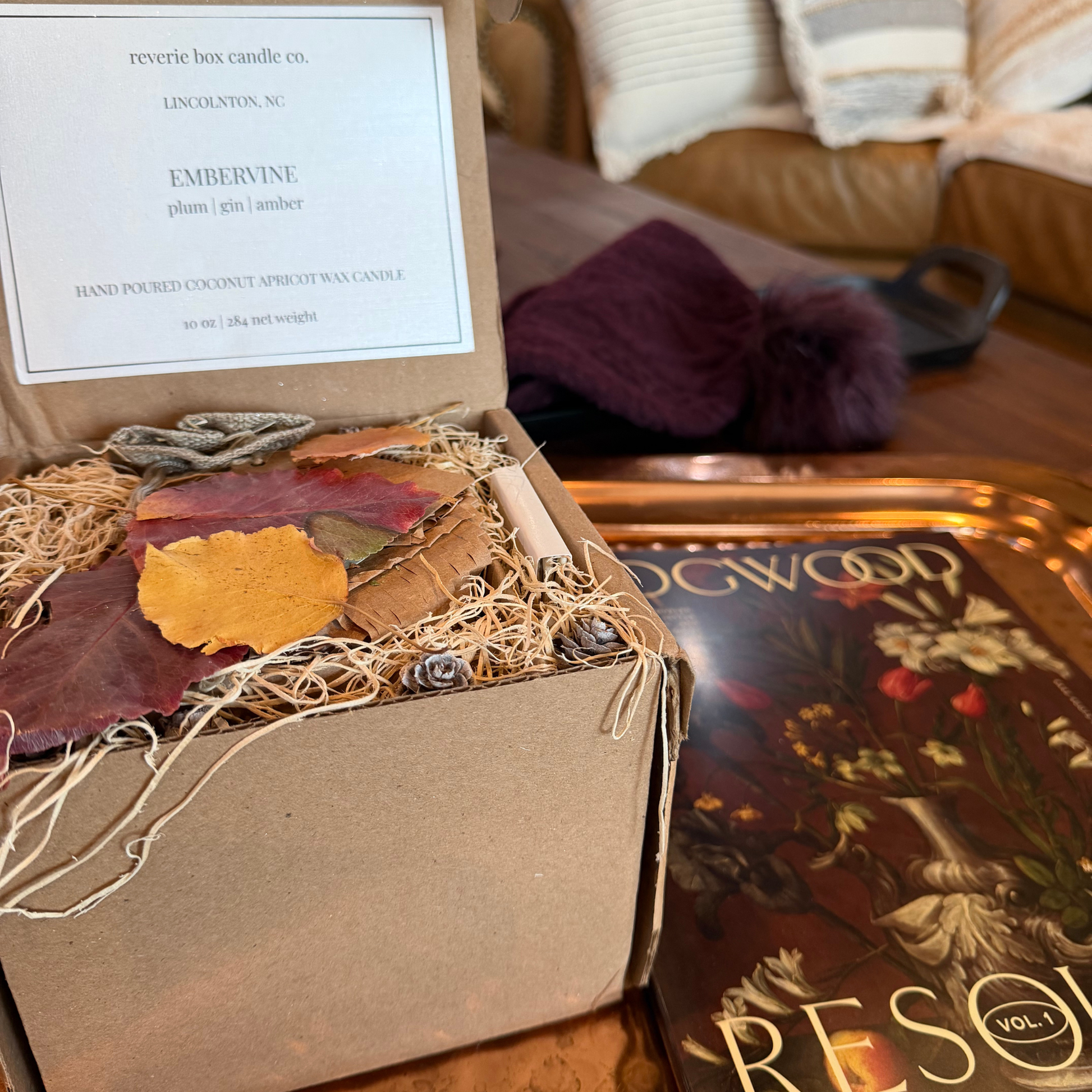 Reverie Box Embervine candle with premium packaging and cork lid lifestyle shot