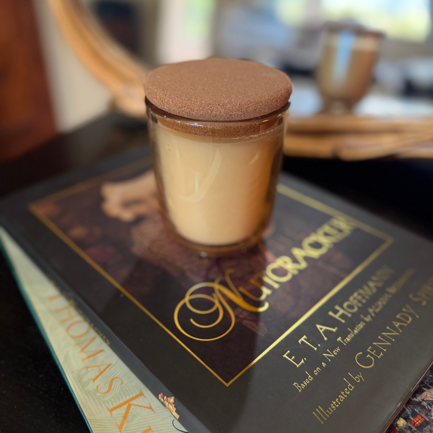 Embervine luxury hand-poured soy candle in amber glass vessel with cork lid